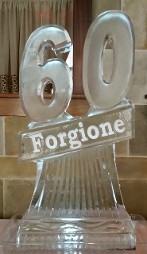 Carved 60 on angle with name under