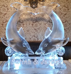 Kissing Dolphins with name plaque in front