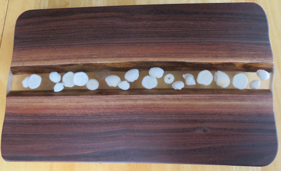 Treemendous Wood Creations Black Walnut Serving Board with White Shells in Clear Resin Treemendous Wood Creations Black Walnut Serving Board with White Shells in Clear Resin