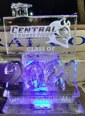 Carved Year in front of Snowfilled Logo with Graduation Cap