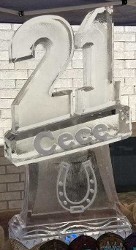 Carved 21 with snowfilled name under and snowfilled horseshoe in base