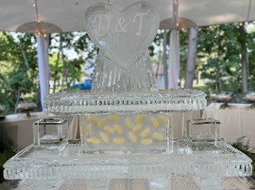 ice matters - 54 inch base two tier tray with personalized heart shrimp tower on top - lemon slices frozen into support leg and lemon holder on each side