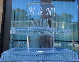ice matters - two tier tray with snowfilled initials topper with cut corners