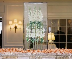 ice matters 72  x 20 inch base tray with silks frozen block set in center of tray