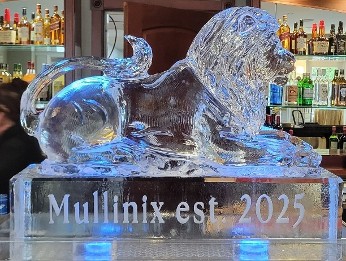 ice matters - lion laying down - on raised base with snowfilled wording