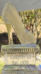 ice matters carved shoe on base with snowfilled wording