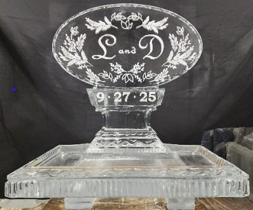 ice matters horizontal oval logo with snowfilled foliage and initials with date in base on back of 40 inch tray