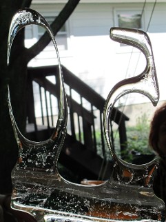 Ice Matters Individual Table Centerpiece - Carved 50 at end of its life outside in August