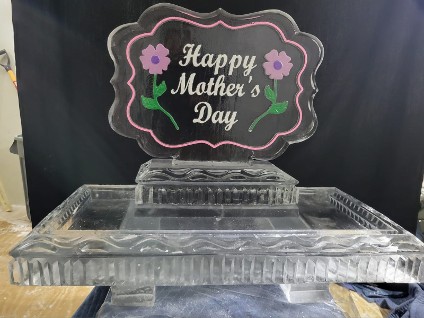 37.)  ice matters - color border and flowers logo with snowfilled happy mother's day on back of 40 inch tray