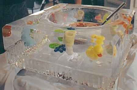Ice Matters Punch Bowl with Baby Items frozen into the ice