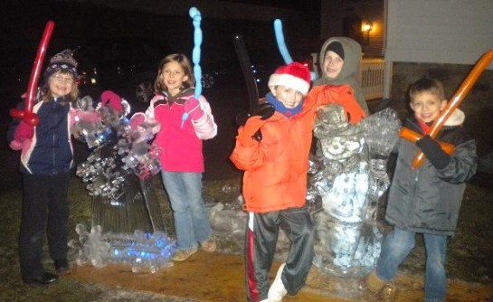 Adorable kids with snowman and snowflake